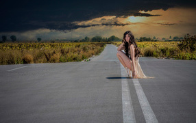 Ballerina sat on the road