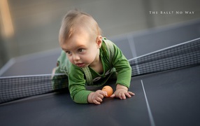 	  A child at the tennis table