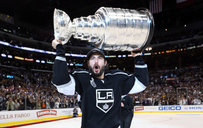 Best Hockey player Drew Doughty and his trophy