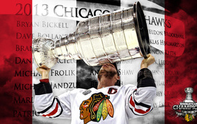 Hockey player Jonathan Toews and his trophy