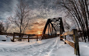 Bridge over the river in winter