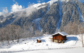 The house in the winter mountains