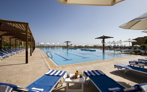 Hotel swimming pool on the coast in the resort of Taba, Egypt