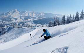 Downhill skiing at Megeve ski resort, France