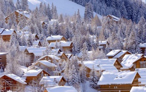 Snow-covered house in the ski resort of Meribel, France