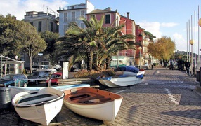 Boats on the promenade in the resort of Celle Ligure, Italy