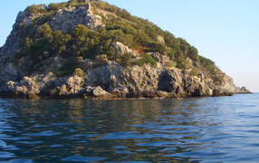 Island off the coast of the resort Spotorno, Italy