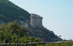 Tower on a mountain slope in the resort Sabaudia, Italy