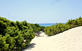 White sand on the beach at the resort of Villasimius, Italy