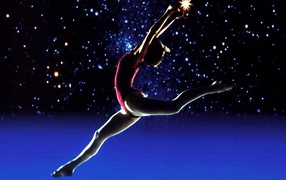Ballerina on a background of stars