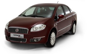 Dark brown Fiat Linea on a white background