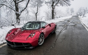 Red Super Car on winter road