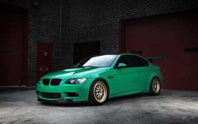Green BMW E92 M3 in the garage