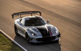 Grey sporty Dodge Viper ACR on the highway