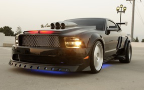 Black mustang with glowing lights