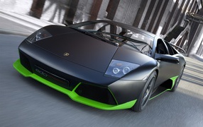 Black Lamborghini with a green rim