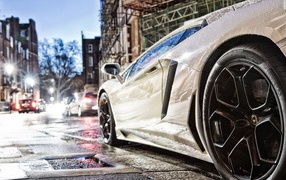 Lamborghini in the rain on a city street