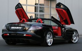 Black Mercedes with open doors
