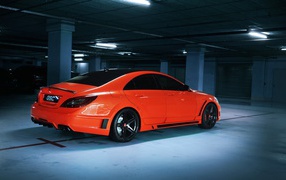 Orange Mercedes in the parking lot