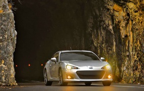 Silver Subaru BRZ leaves the tunnel