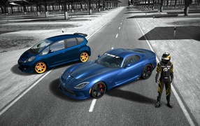Гонщик с автомобилями в игре Gran Turismo 6