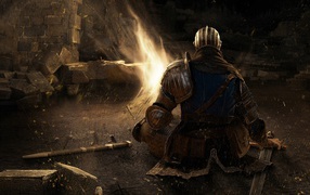 Soldiers in armor around the campfire in the game Dark Souls