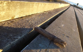 A piece of board on a wooden platform