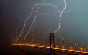 Lightning strikes in the bridge during a storm