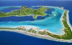 The reefs around the island in the ocean