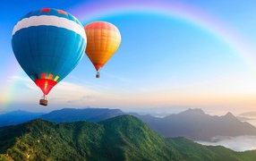 Two balloons over the mountains