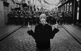 Anonymous on the background of police