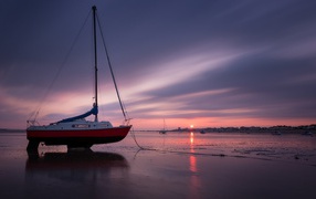 Boat on the land at low tide