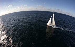 Yacht in the vast ocean