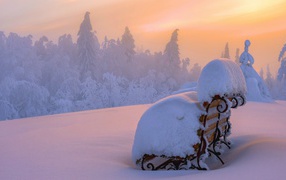 Bench after heavy snowfall