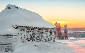 Hut plastered with snow