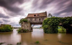 House on the bridge over the river, France