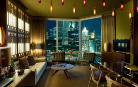 Cozy living room with a view of the big city