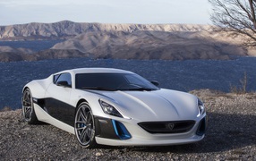 Rimac Concept One sports car on the background of mountains