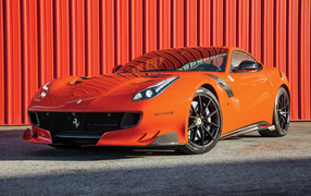 Оранжевый спортивный автомобиль Ferrari F12tdf, 2017