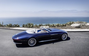 Blue car cabriolet Mercedes-Maybach 6 on the background of the ocean