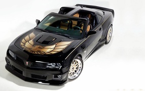 Black sports car Pontiac Firebird on white background 