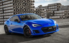 Blue car Subaru BRZ tS, 2018 on the background of pipes