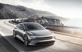 Silver Lucid Air on the track