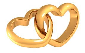 Two golden hearts on a white background