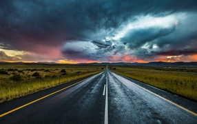 Road under a beautiful cloudy sky