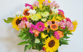 Beautiful bouquet with flowers alstroemerias, gerberas, chrysanthemums and sunflowers