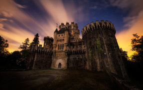 Butron Castle on the background of the starry sky in the evening, Gatik. Spain