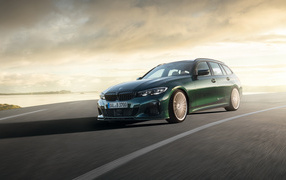2019 green Alpina B3 Touring car on the road