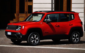 Red Jeep Renegade Trailhawk Plug-In Hybrid, 2019 in front of the building
