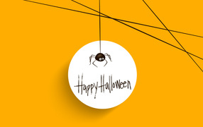 White circle with a spider and an inscription on an orange background on Halloween